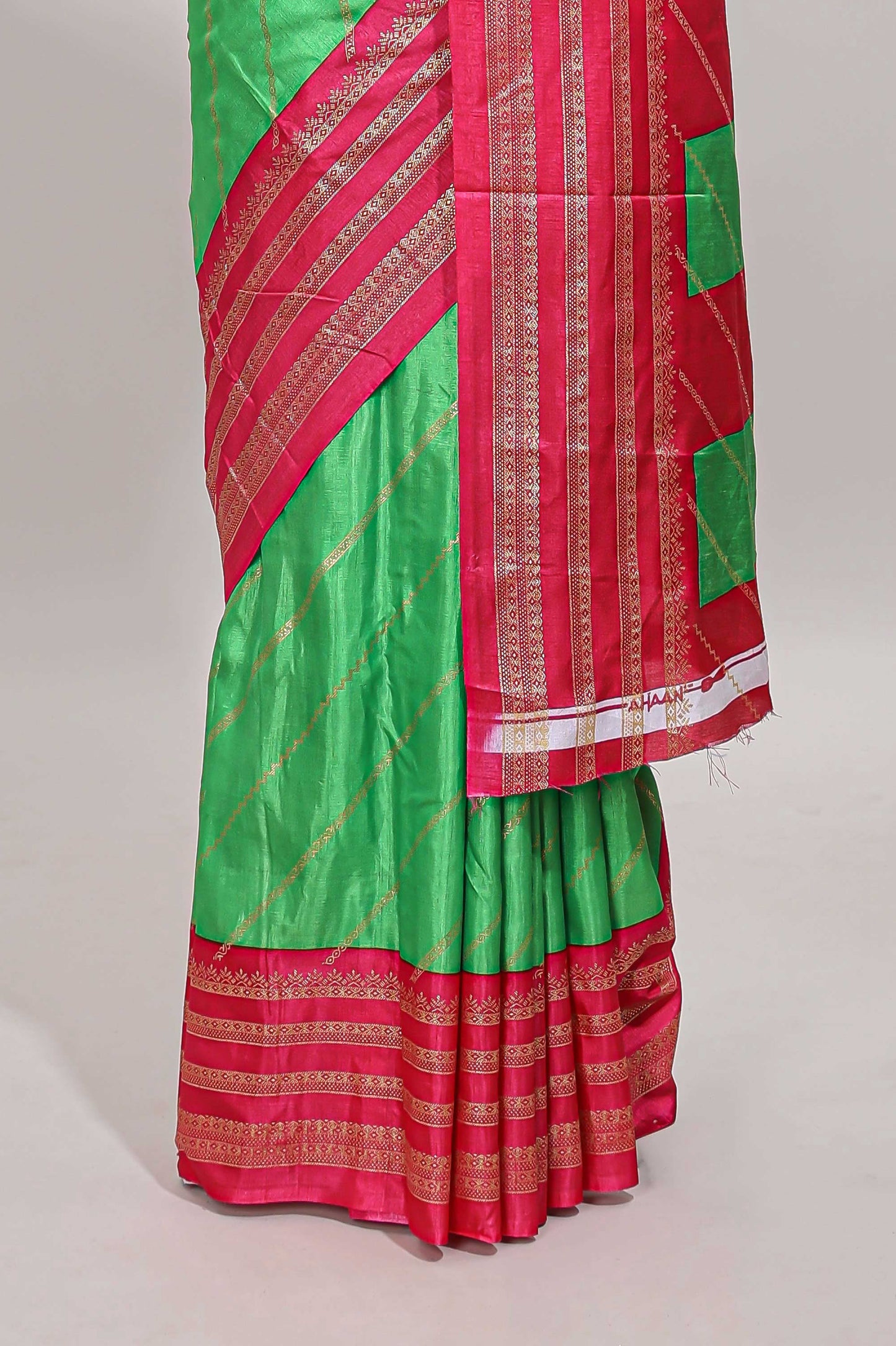Neon green zari striped saree in dola silk with contrast woven border and blouse