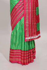 Neon green zari striped saree in dola silk with contrast woven border and blouse