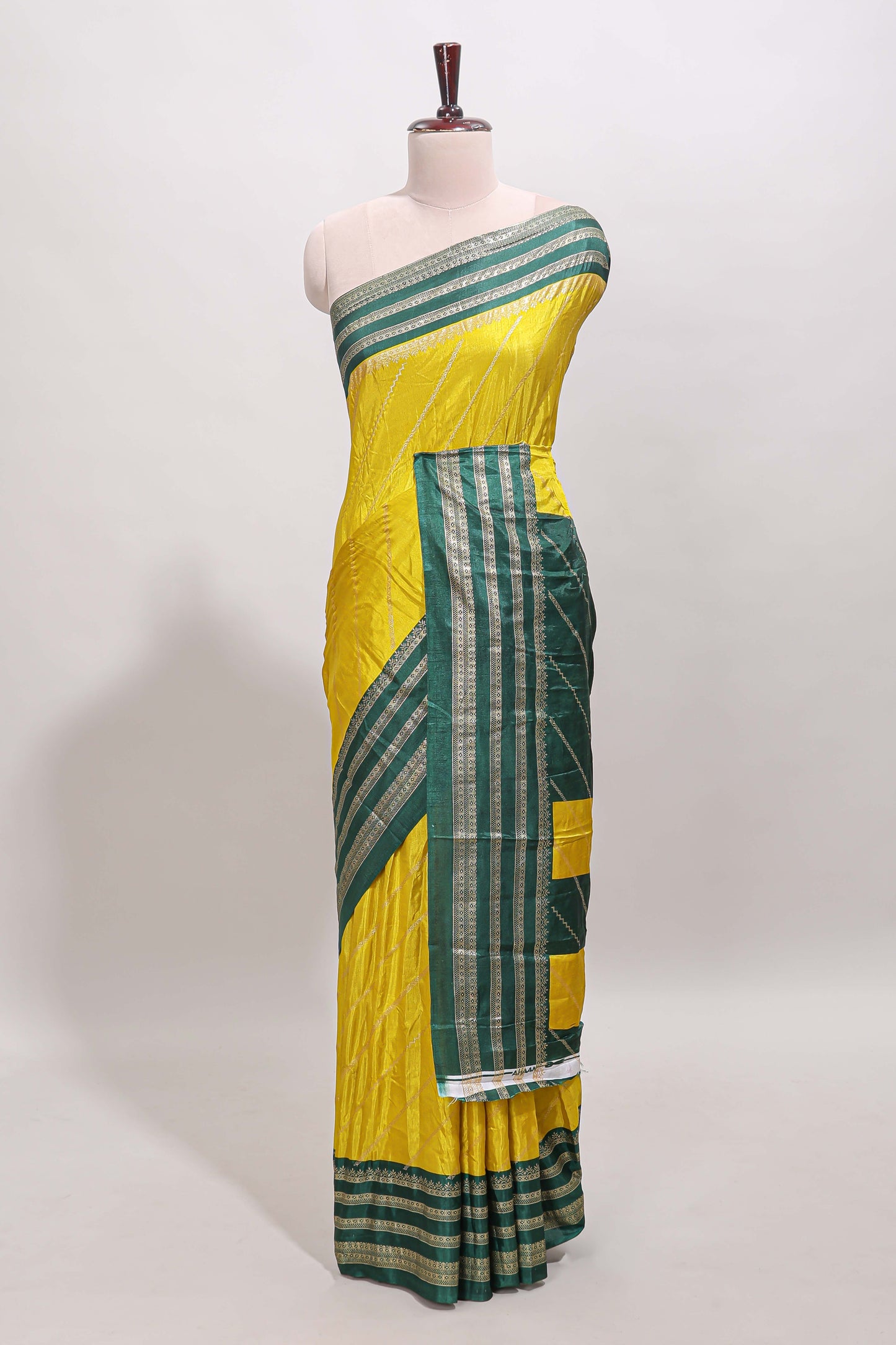Yellow zari striped saree in dola silk with contrast woven border and blouse