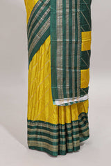 Yellow zari striped saree in dola silk with contrast woven border and blouse