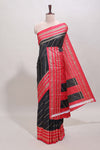 Black zari striped saree in dola silk with contrast woven border and blouse