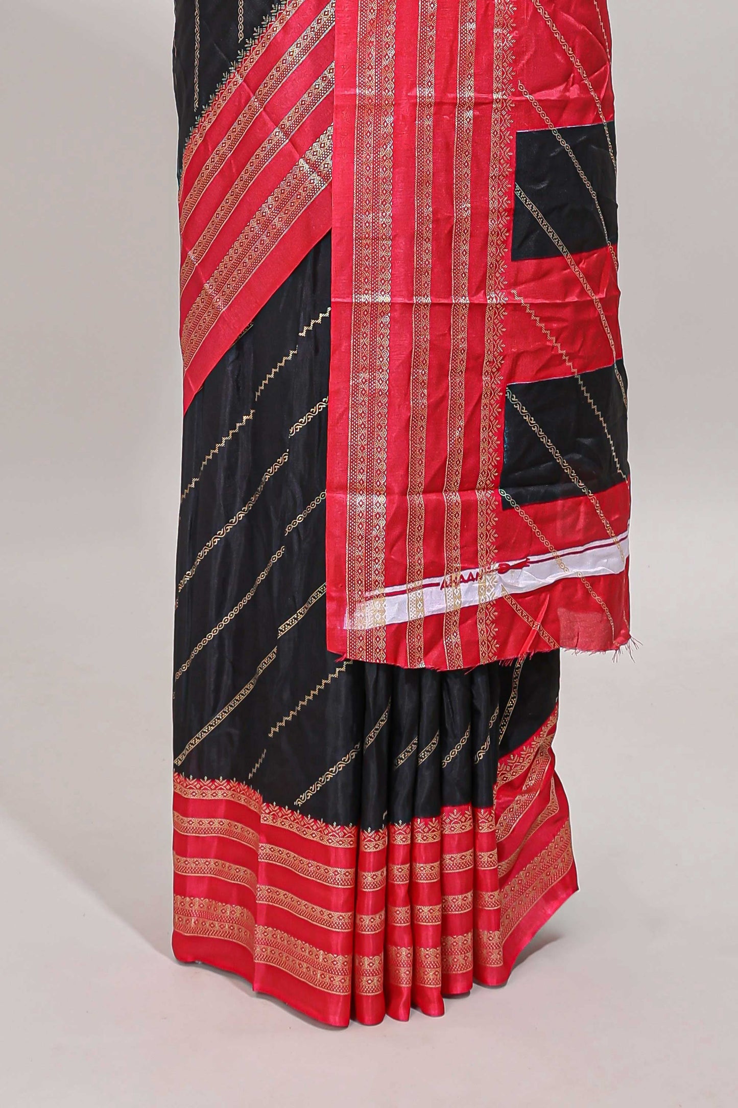 Black zari striped saree in dola silk with contrast woven border and blouse