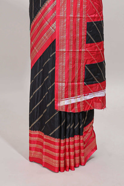 Black zari striped saree in dola silk with contrast woven border and blouse