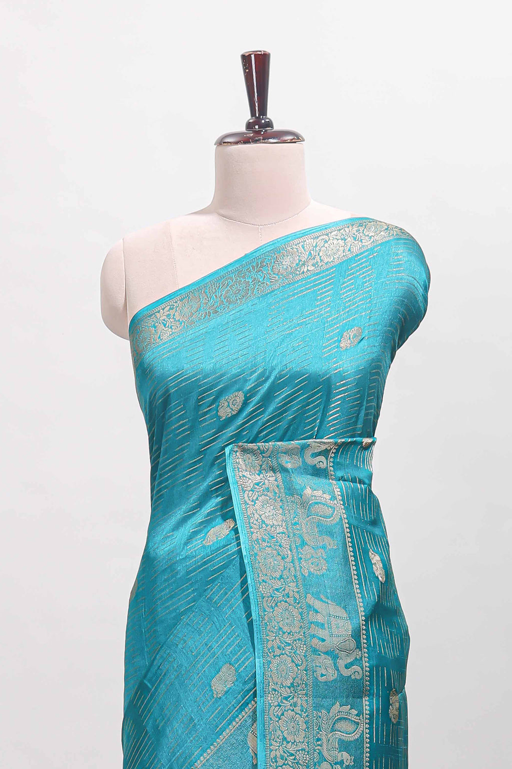 Turquoise blue zari butta dola silk saree with self zari border and printed pallu