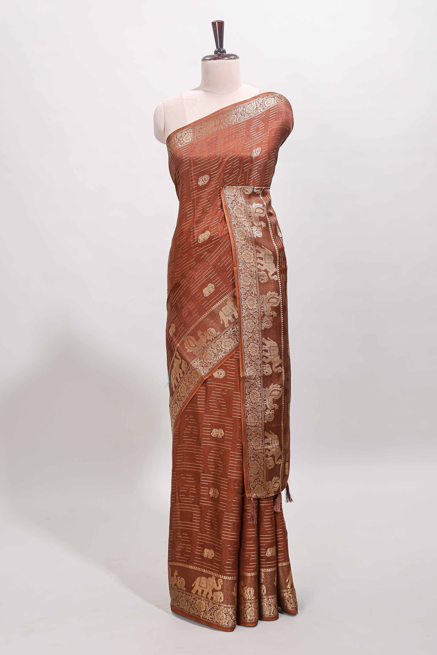Brown zari butta dola silk saree with self zari border and printed pallu