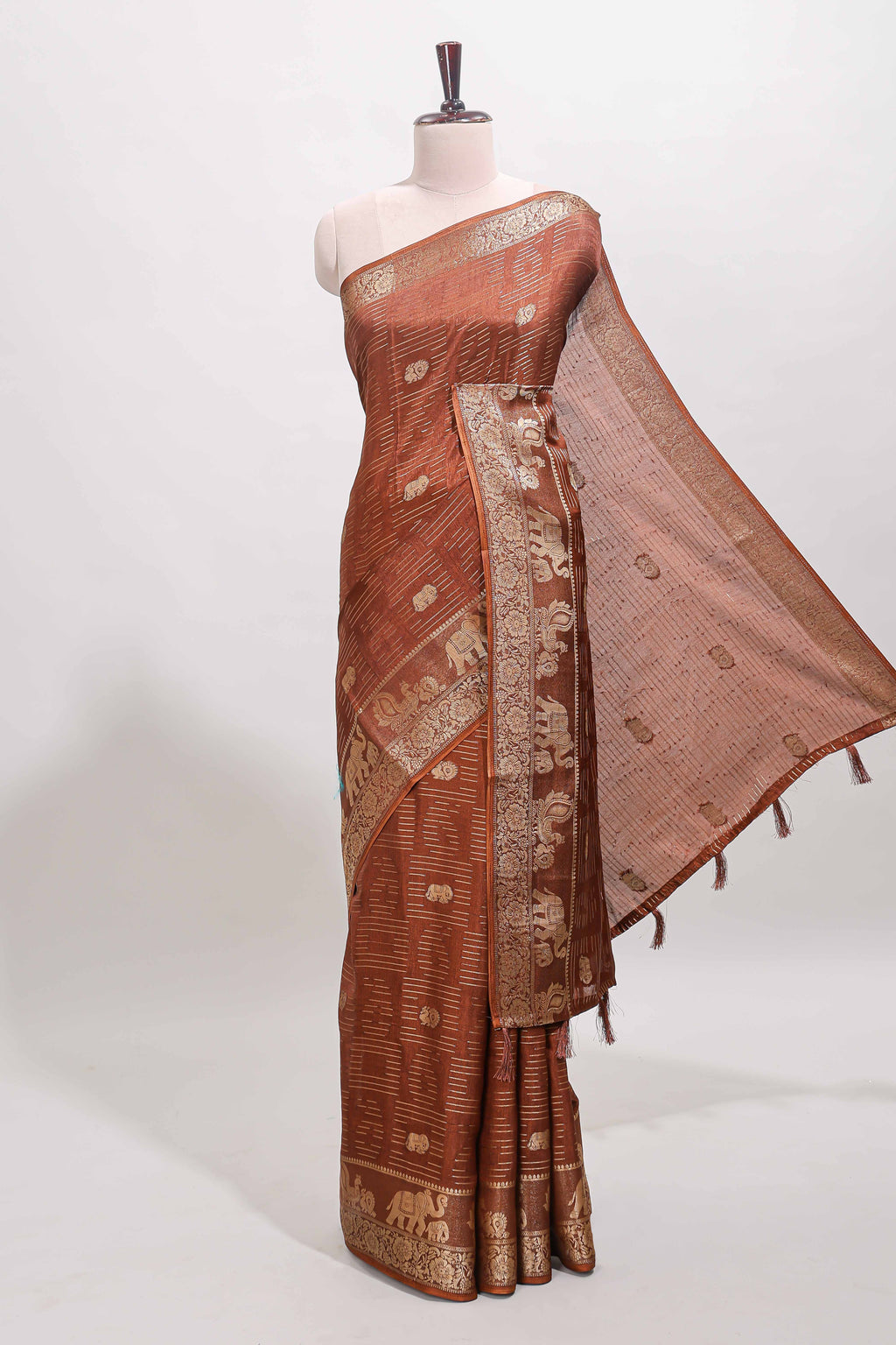 Brown zari butta dola silk saree with self zari border and printed pallu