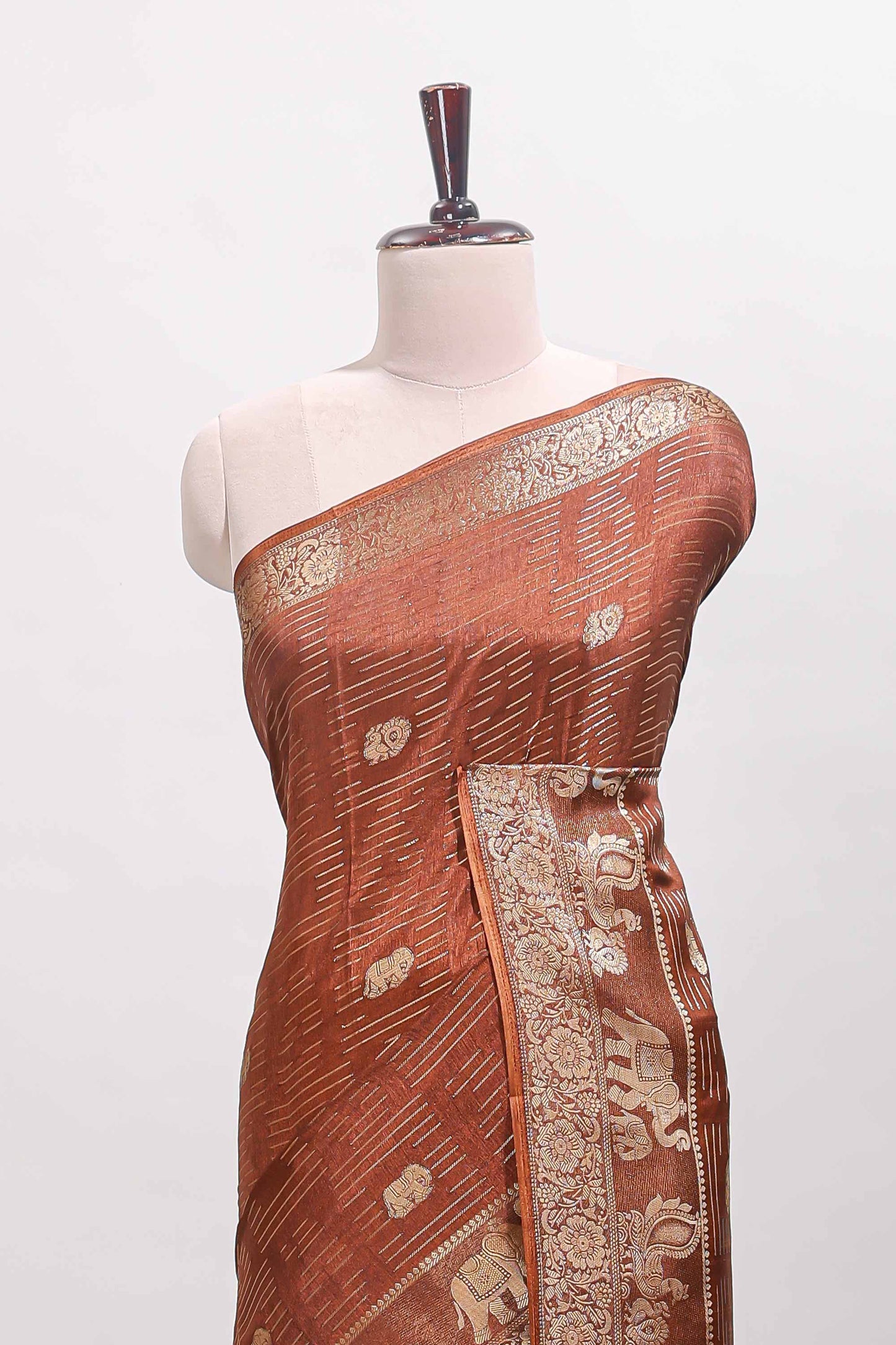 Brown zari butta dola silk saree with self zari border and printed pallu