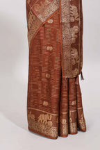 Brown zari butta dola silk saree with self zari border and printed pallu