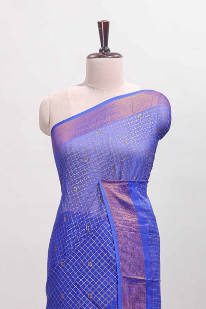 Blue checked zari butta dola silk saree with self zari border and matching blouse