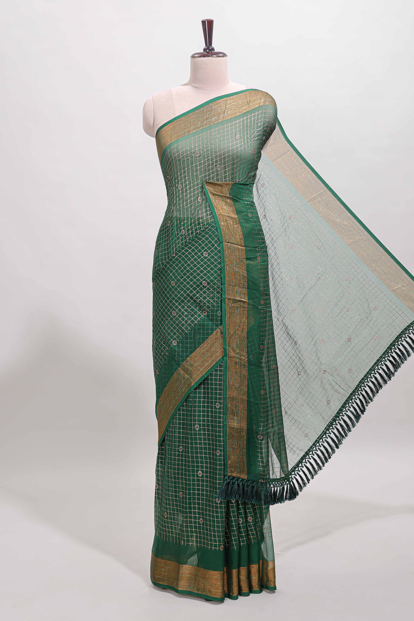Green checked zari butta dola silk saree with self zari border and matching blouse