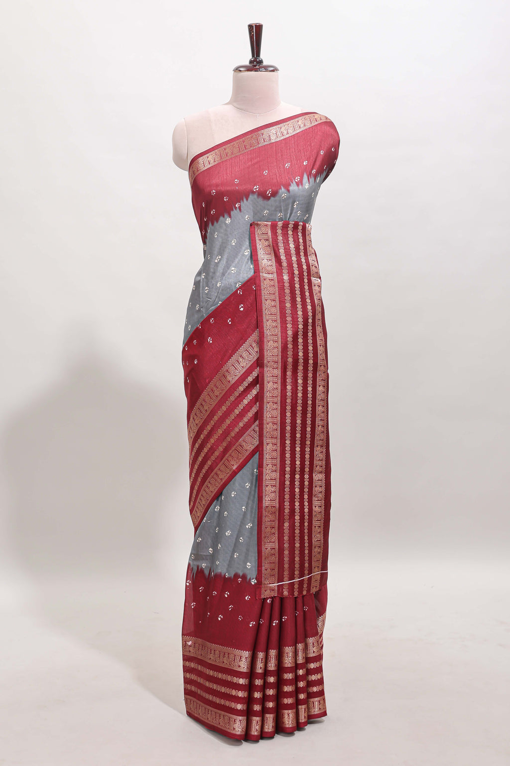 Grey unique buttas dola silk saree with contrast zari border and blouse