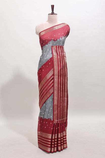 Grey unique buttas dola silk saree with contrast zari border and blouse