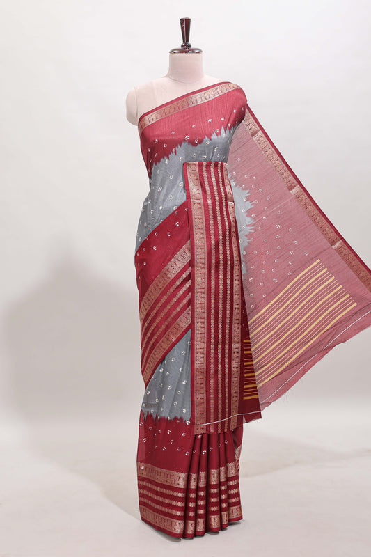 Grey unique buttas dola silk saree with contrast zari border and blouse