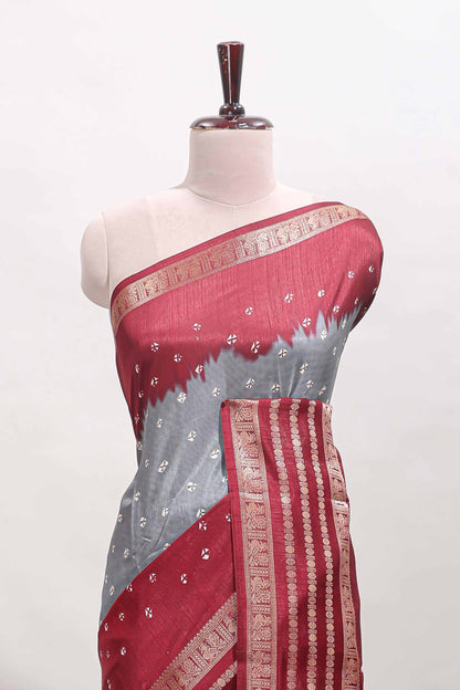 Grey unique buttas dola silk saree with contrast zari border and blouse