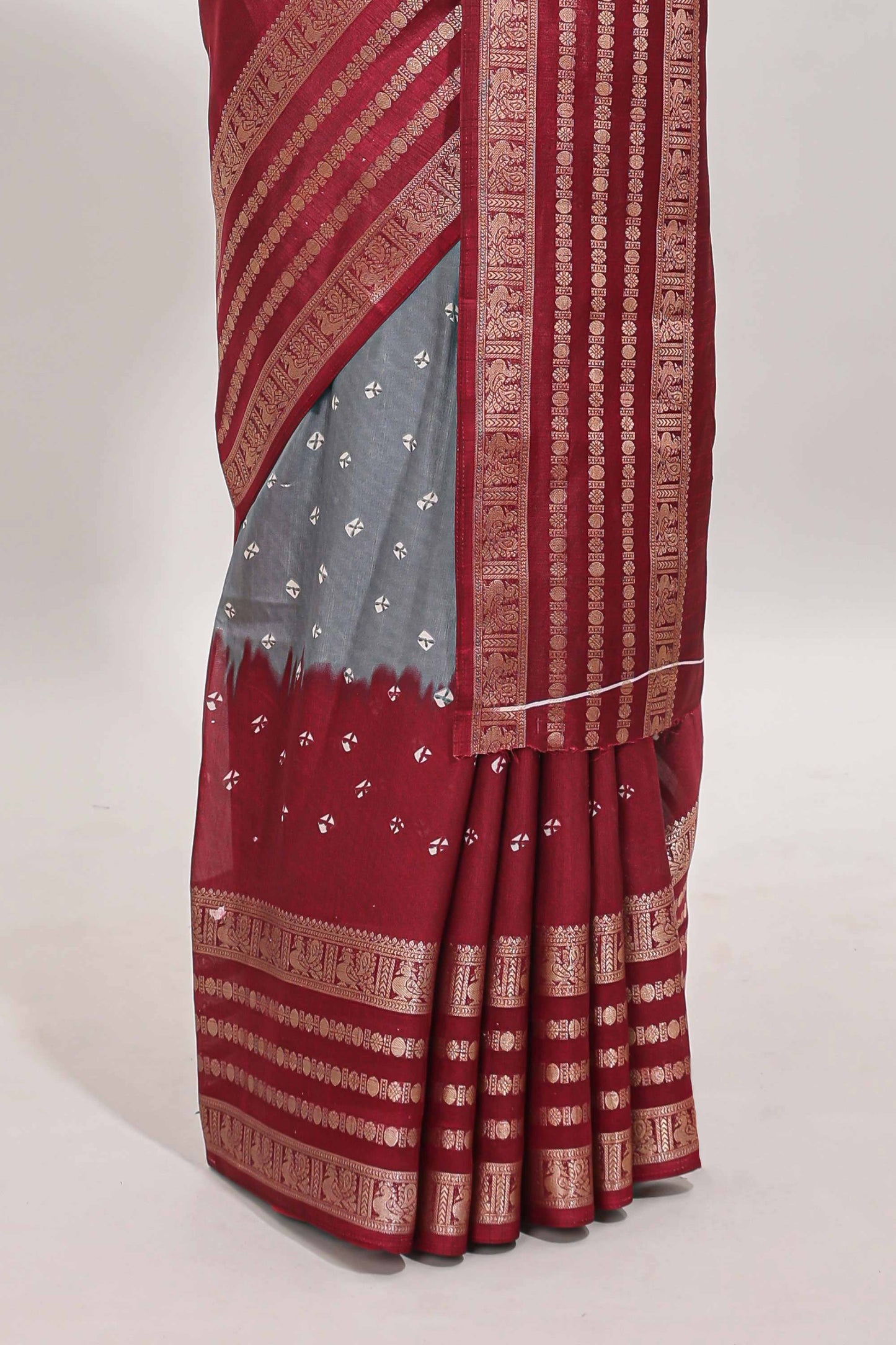 Grey unique buttas dola silk saree with contrast zari border and blouse