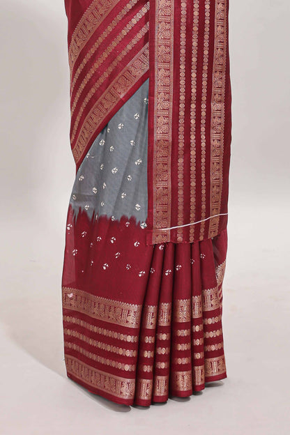 Grey unique buttas dola silk saree with contrast zari border and blouse