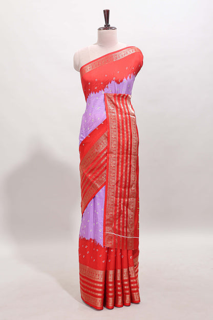 Lavender unique buttas dola silk saree with contrast zari border and blouse