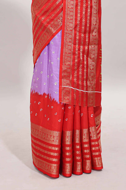 Lavender unique buttas dola silk saree with contrast zari border and blouse