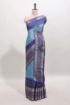 Turquoise blue unique buttas dola silk saree with contrast zari border and blouse
