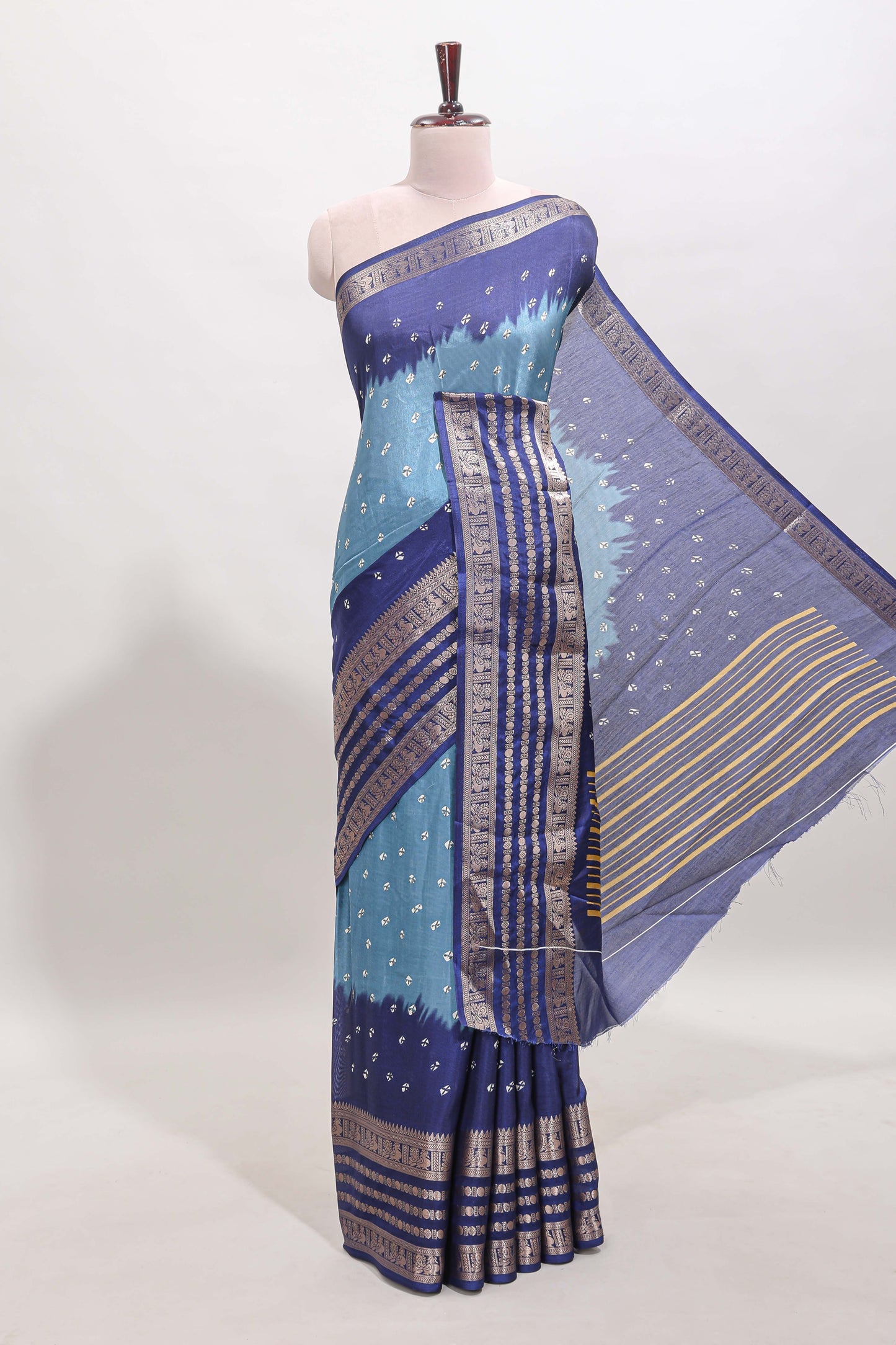 Turquoise blue unique buttas dola silk saree with contrast zari border and blouse