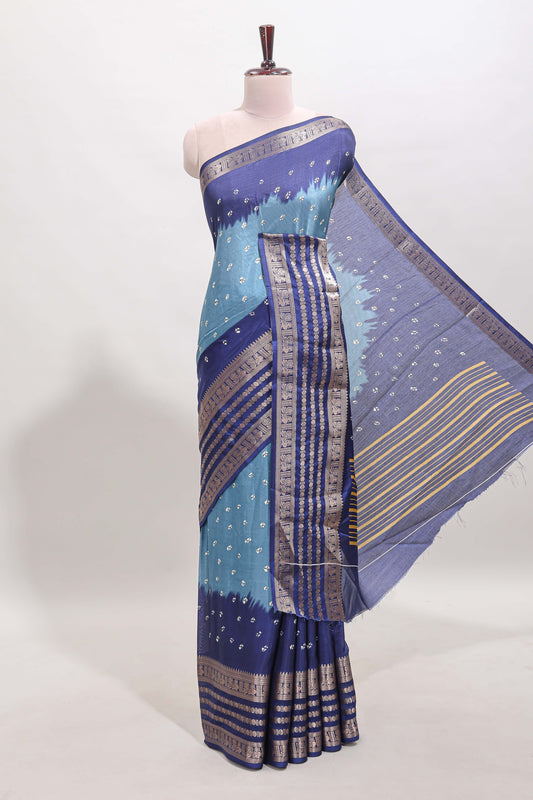 Turquoise blue unique buttas dola silk saree with contrast zari border and blouse