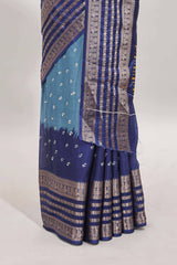Turquoise blue unique buttas dola silk saree with contrast zari border and blouse