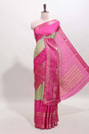 Green unique buttas dola silk saree with contrast zari border and blouse