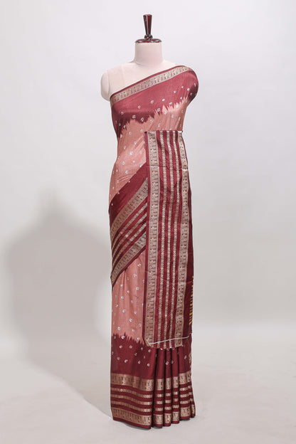 Pink unique buttas dola silk saree with contrast dark green zari border and blouse