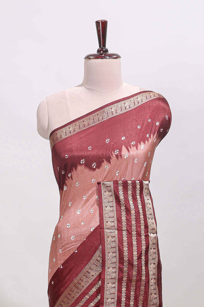 Pink unique buttas dola silk saree with contrast dark green zari border and blouse