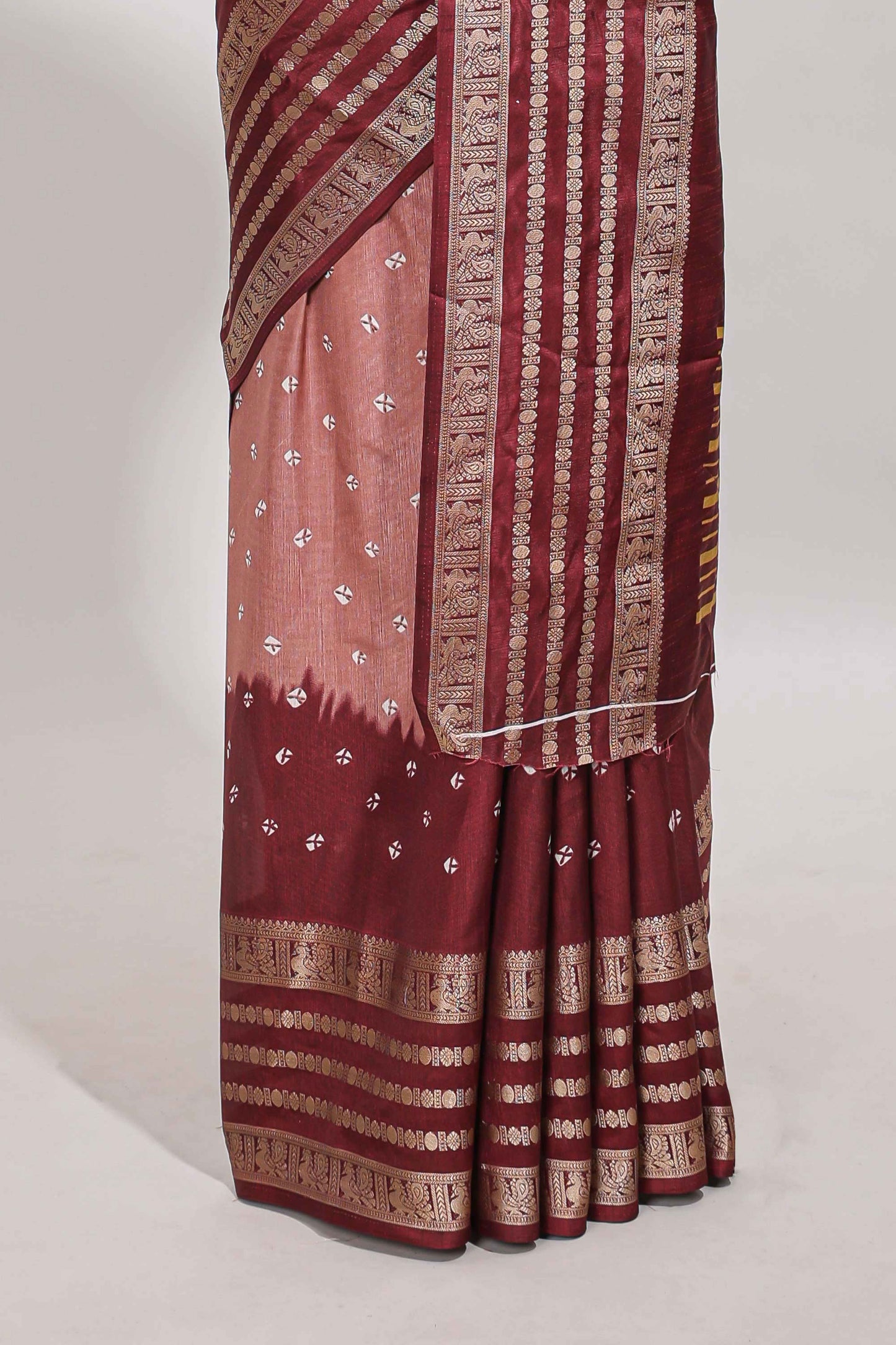 Pink unique buttas dola silk saree with contrast dark green zari border and blouse