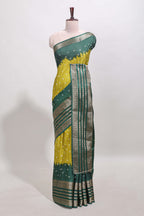 Lemon yellow unique buttas dola silk saree with contrast zari border and blouse