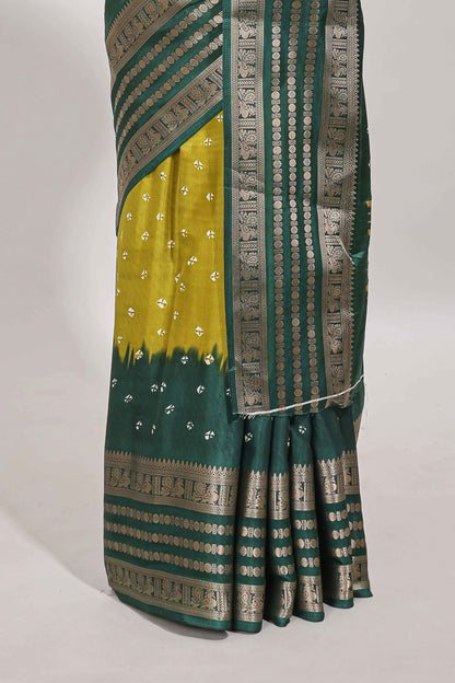 Lemon yellow unique buttas dola silk saree with contrast zari border and blouse