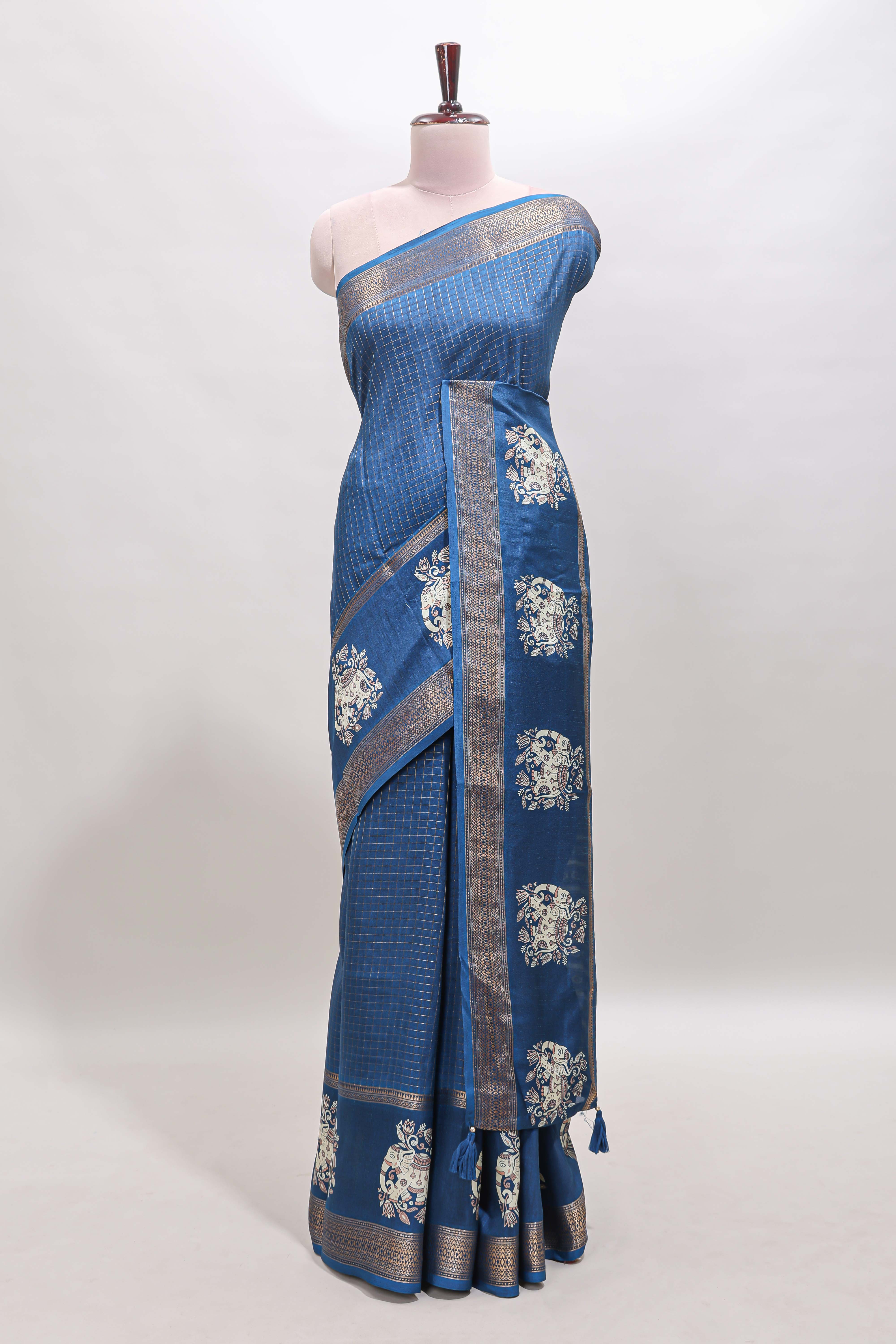 Blue checked elephant motifs dola silk saree with self zari border and striped pallu