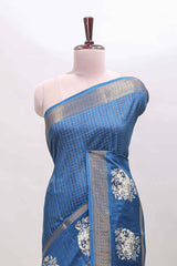 Blue checked elephant motifs dola silk saree with self zari border and striped pallu