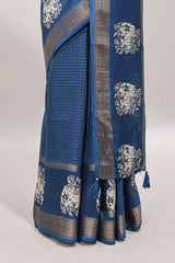 Blue checked elephant motifs dola silk saree with self zari border and striped pallu