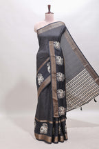 Black checked elephant motifs dola silk saree with self zari border and striped pallu