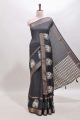 Black checked elephant motifs dola silk saree with self zari border and striped pallu