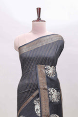 Black checked elephant motifs dola silk saree with self zari border and striped pallu