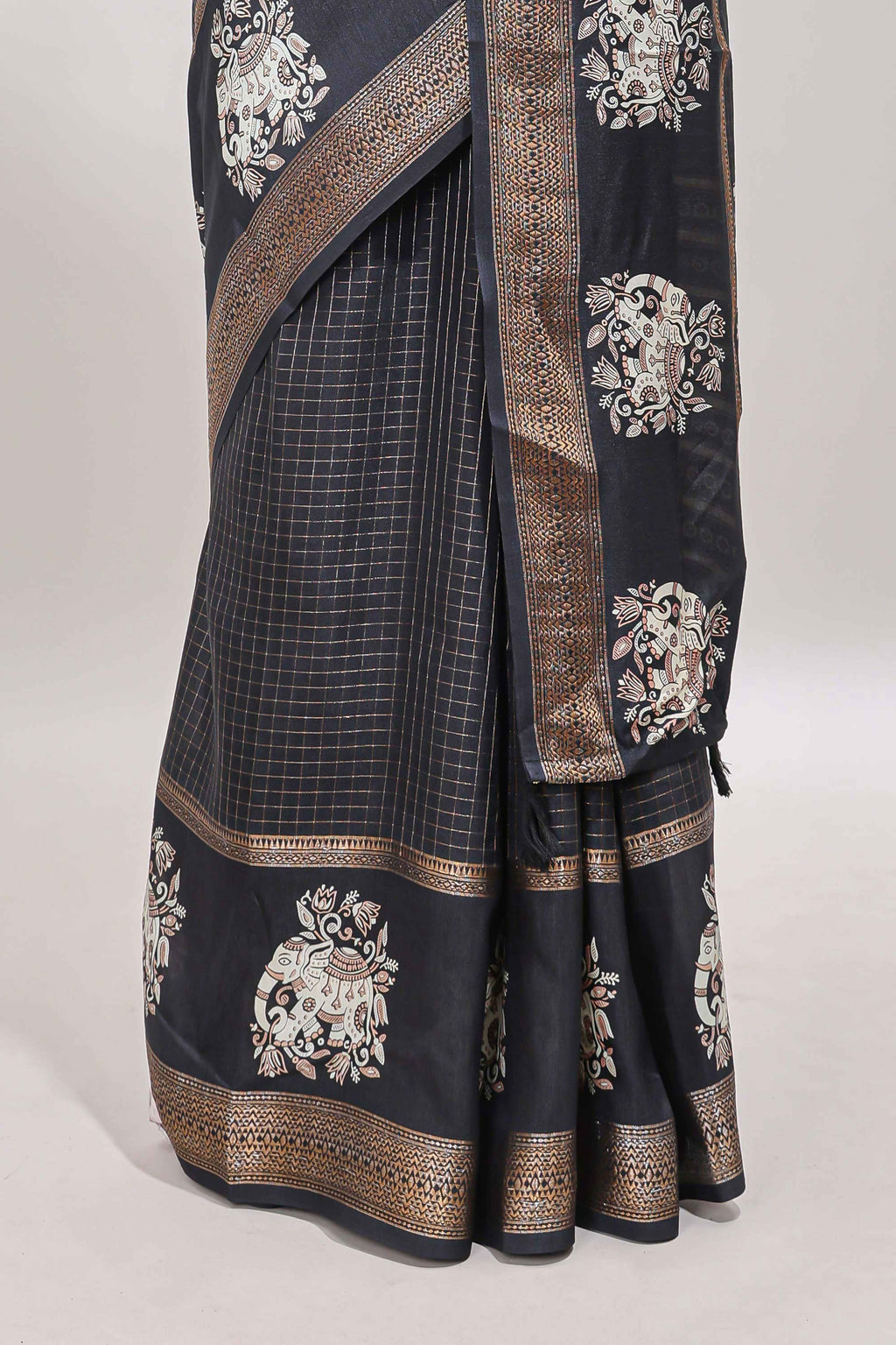 Black checked elephant motifs dola silk saree with self zari border and striped pallu