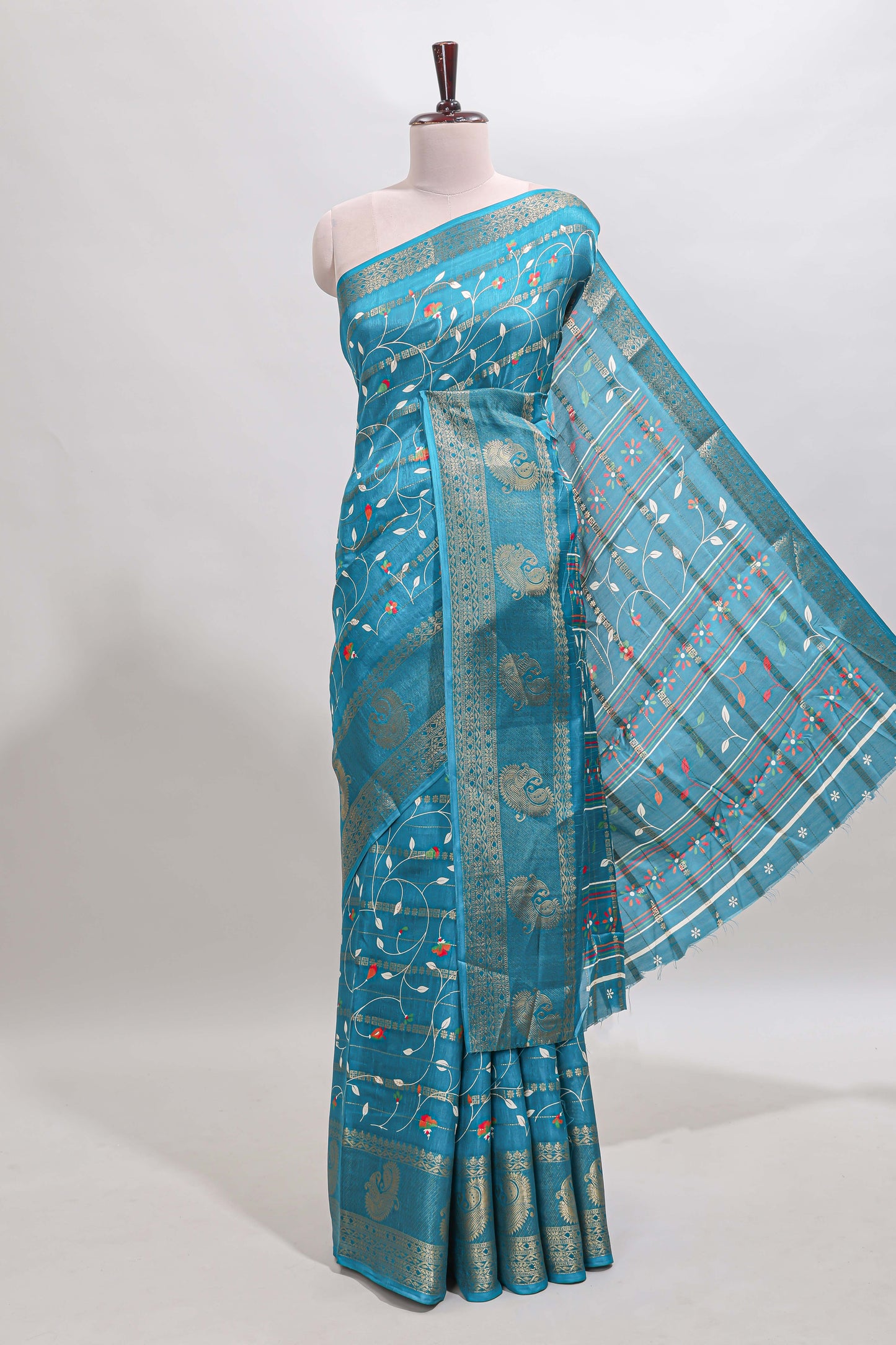 Midnight green zari striped floral vine design dola silk saree with self border and matching blouse