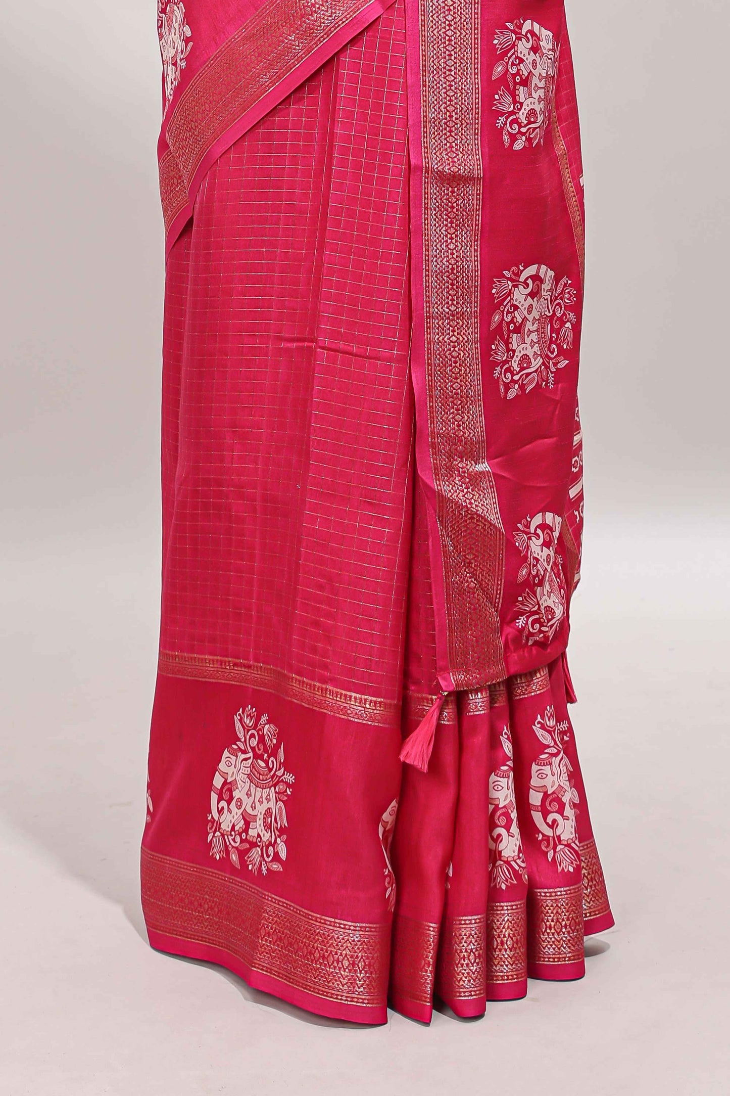 Pink checked elephant motifs dola silk saree with self zari border and striped pallu