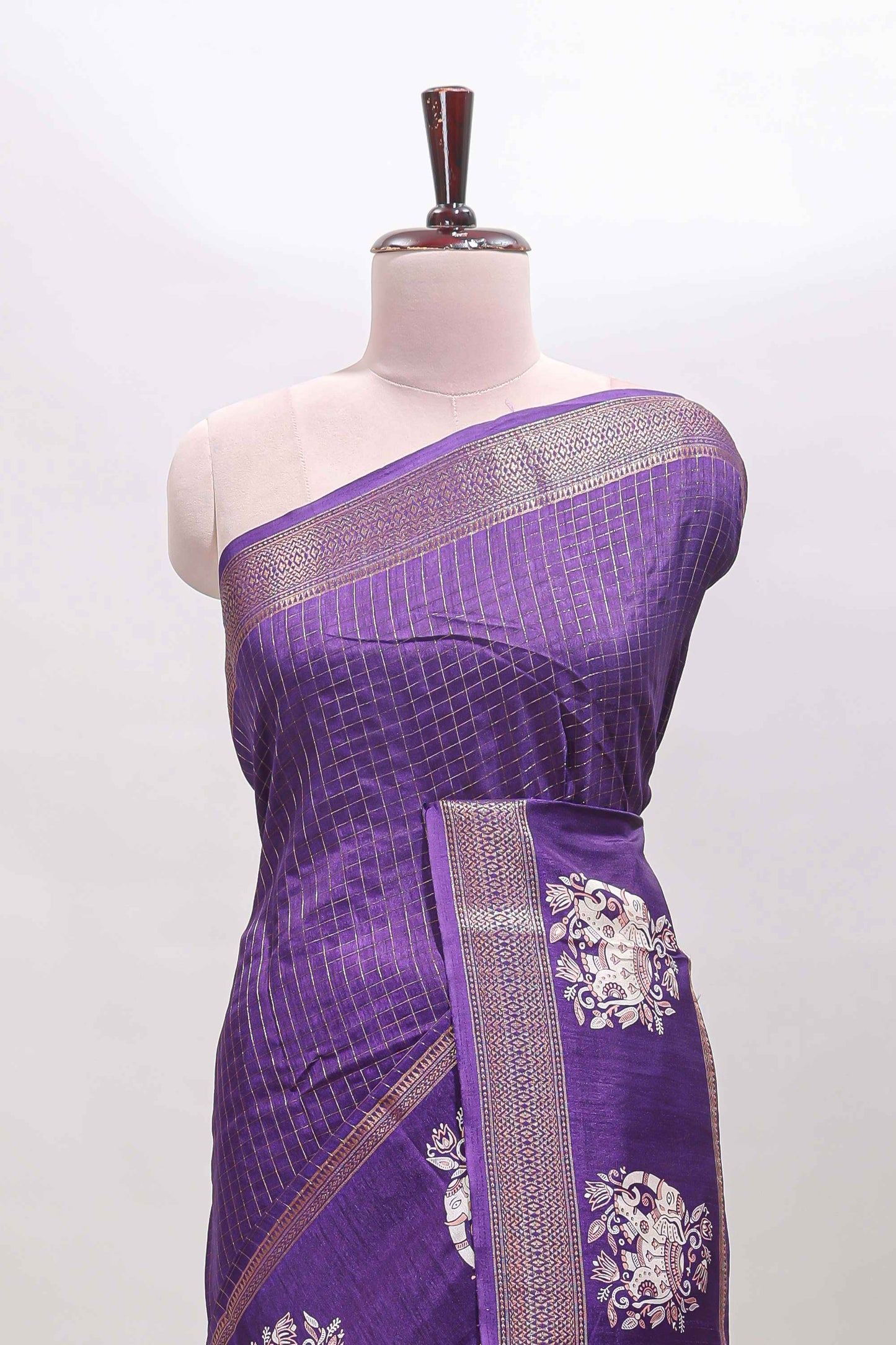 Violet checked elephant motifs dola silk saree with self zari border and striped pallu