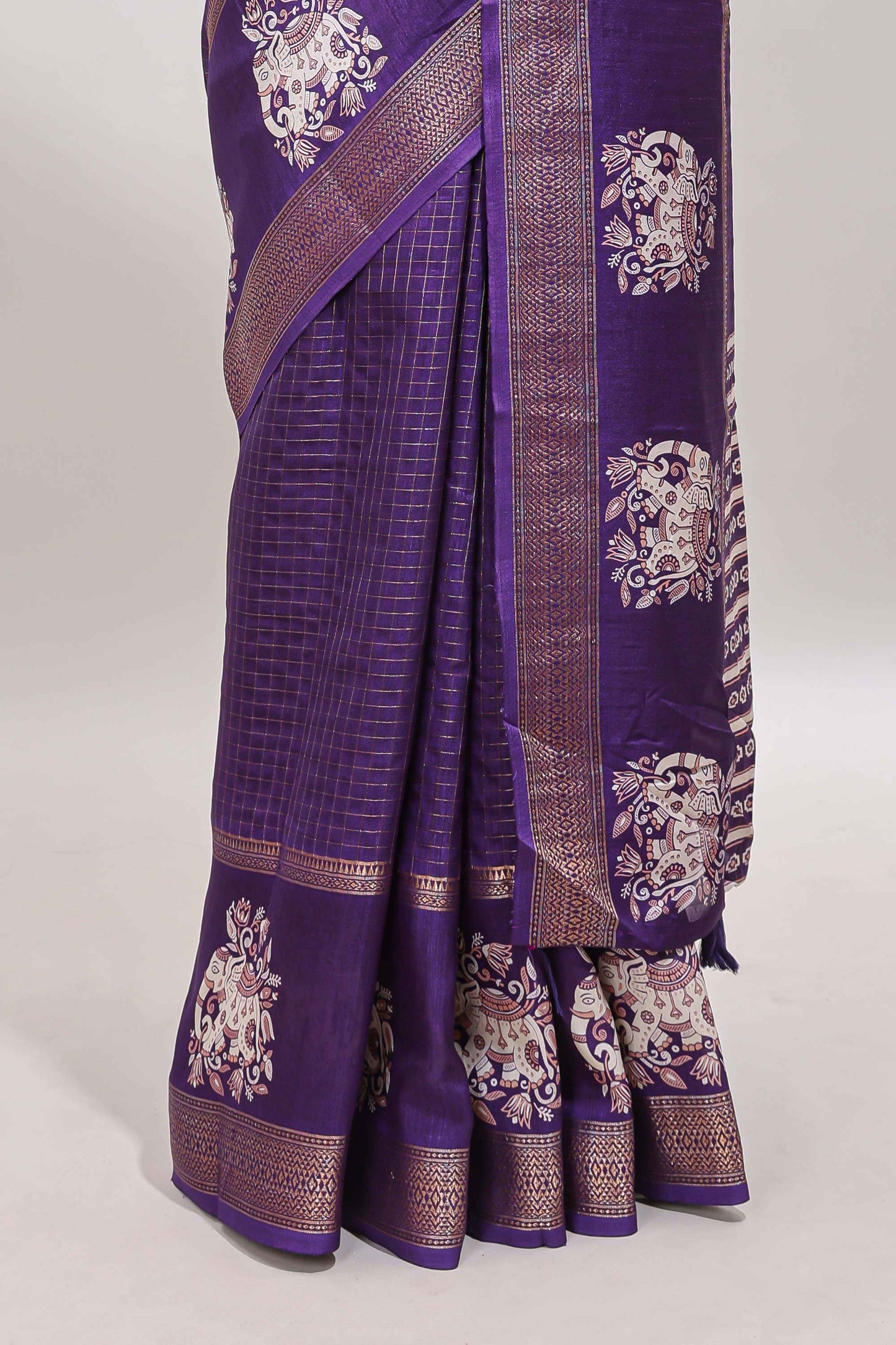 Violet checked elephant motifs dola silk saree with self zari border and striped pallu
