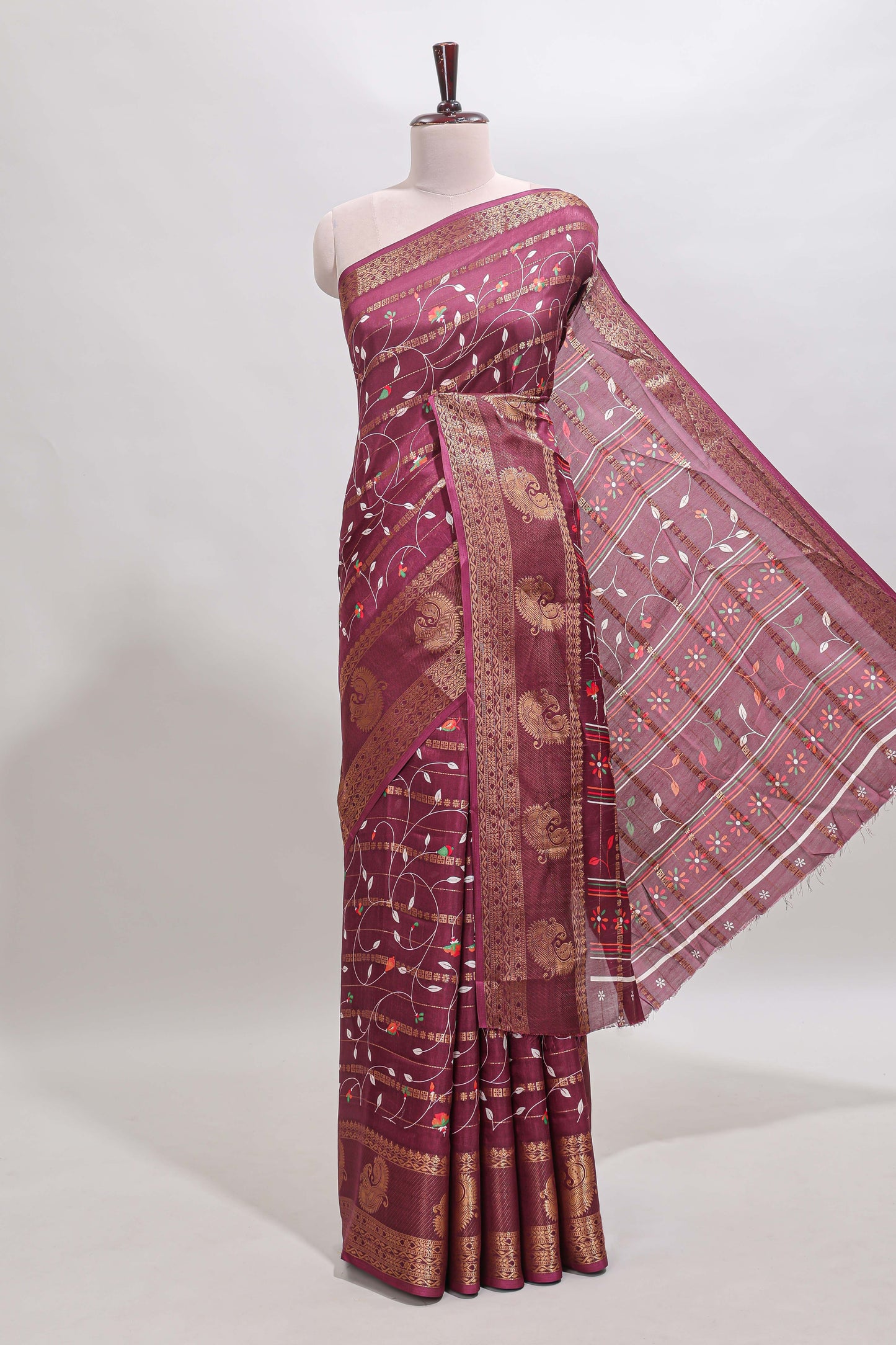 Maroon zari striped floral vine design dola silk saree with self border and matching blouse