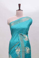 Turquoise green checked elephant motifs dola silk saree with self zari border and striped pallu