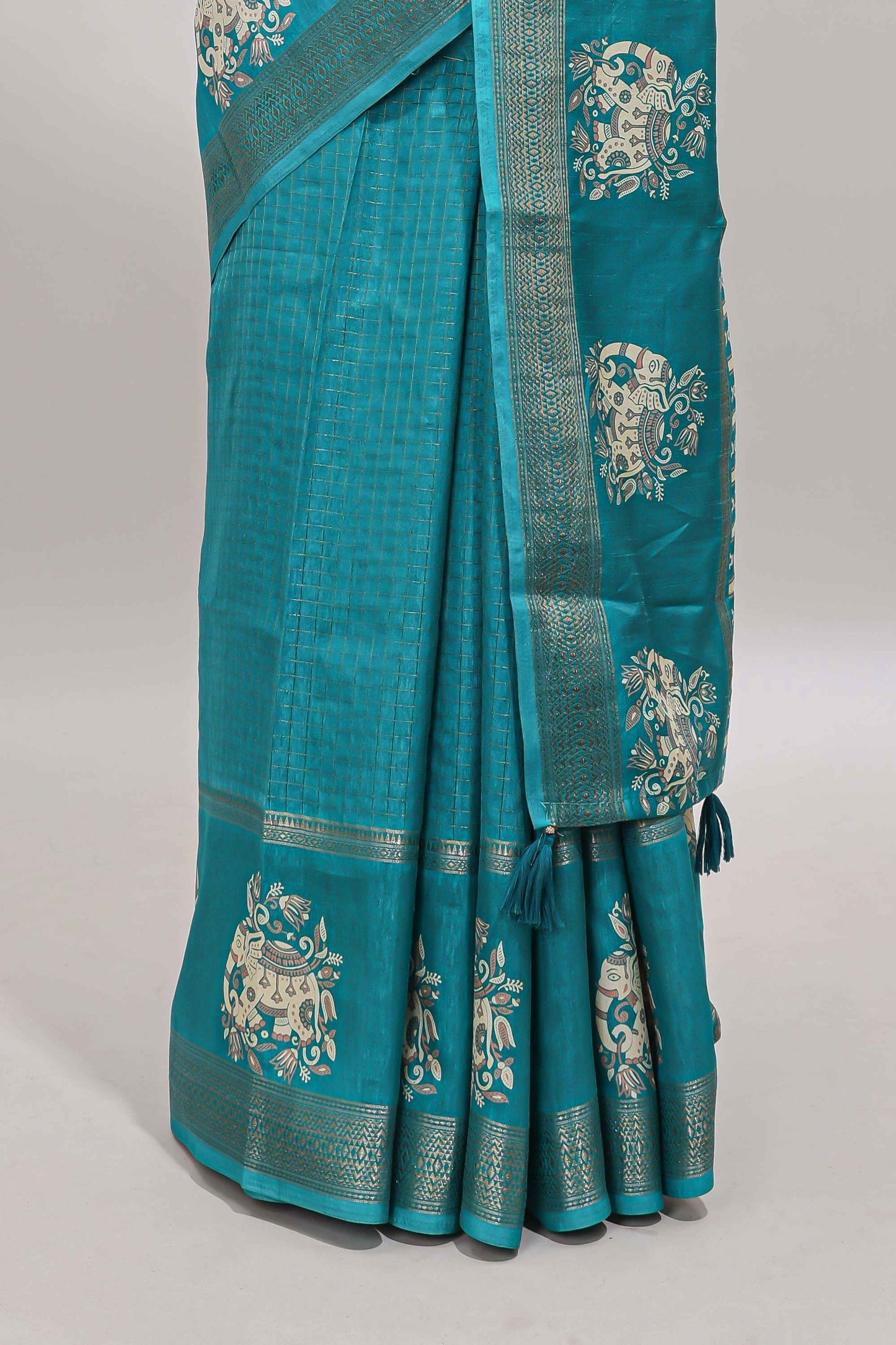 Turquoise green checked elephant motifs dola silk saree with self zari border and striped pallu