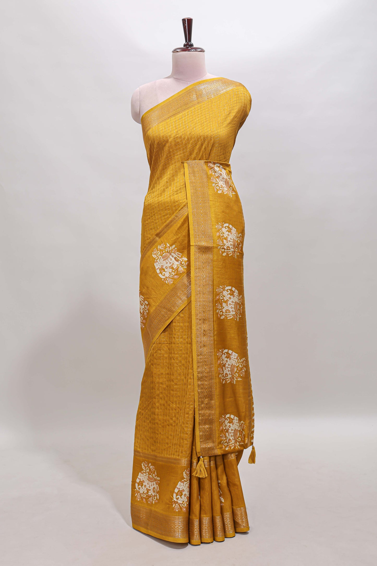 Mustard checked elephant motifs dola silk saree with self zari border and striped pallu