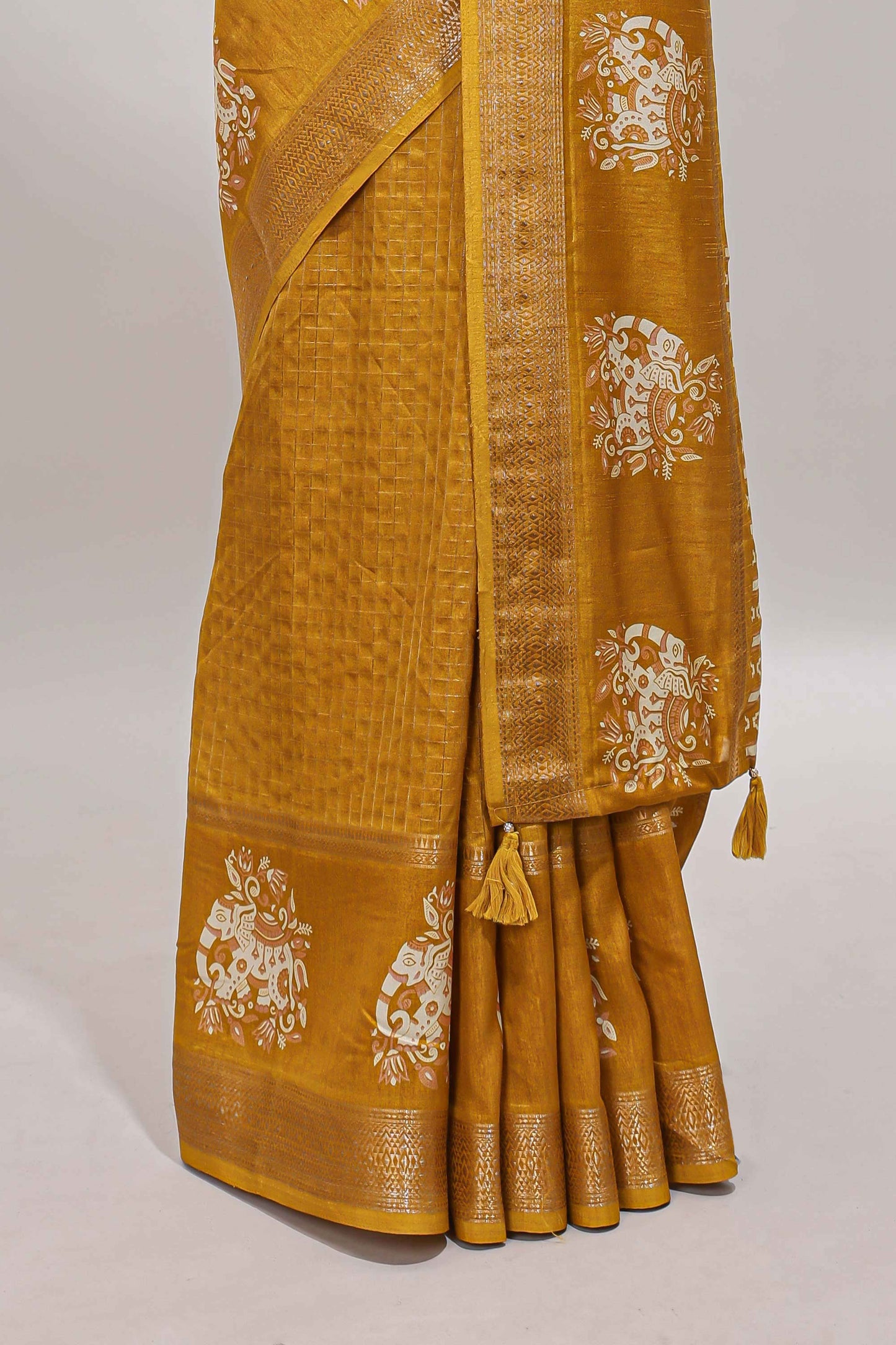 Mustard checked elephant motifs dola silk saree with self zari border and striped pallu