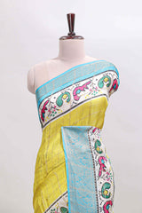 Yellow checked dola silk saree with contrast zari border and blouse
