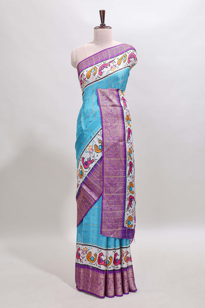 Blue checked dola silk saree with contrast zari border and blouse